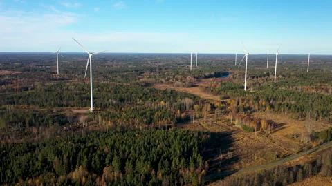 Wind turbines generating clean energy over autumn landscape, aerial view Stock Footage 289013987