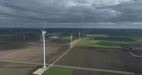 Wind turbines generating clean energy aerial view Stock Footage 328392335