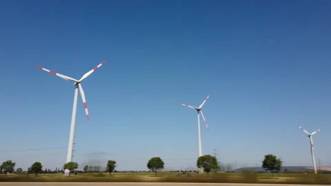 Wind turbines generating electricity next to the german motorway 4k 動画素材 134909359