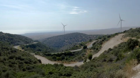 Wind Turbines generating electricity in the summer Stock Footage