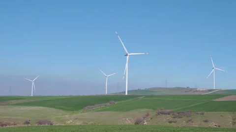 Wind turbines generating energy from the wind Stock Footage 279327934