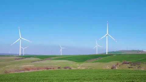 Wind turbines generating energy from the wind Stock Footage 279328033