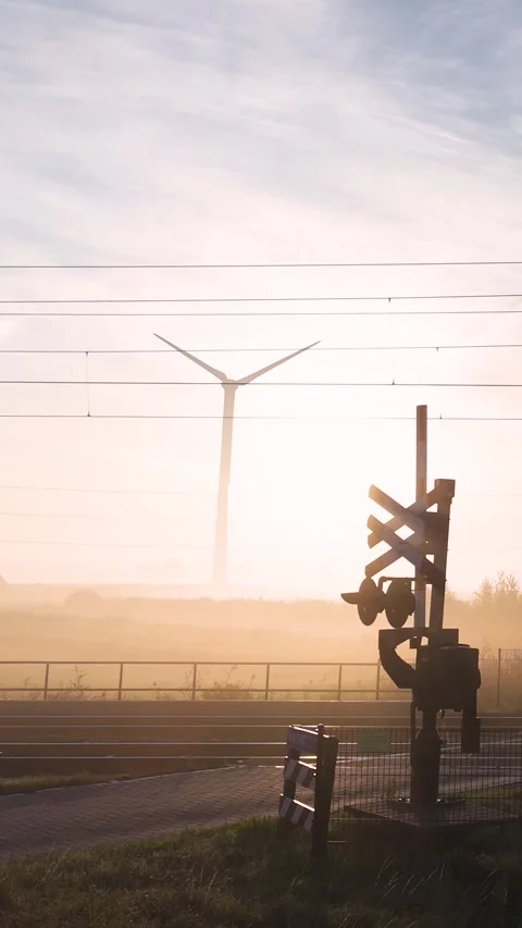 Wind turbines generating renewable energy at sunrise Stock Footage 288241803