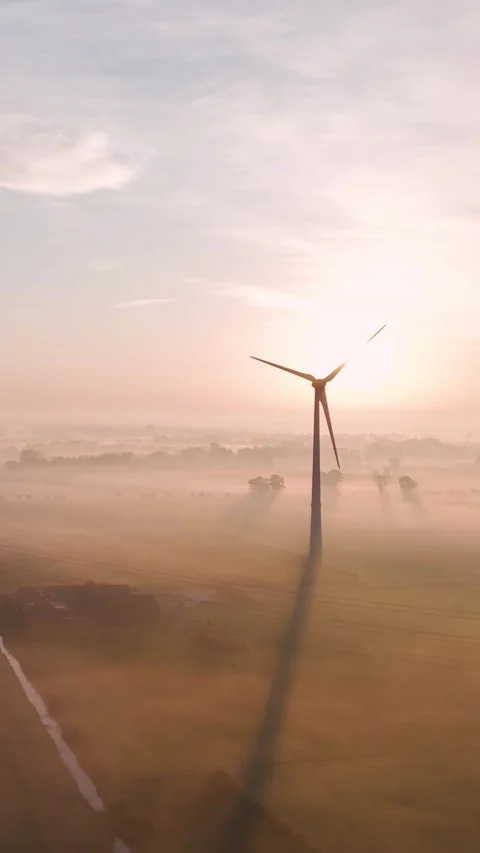 Wind turbines generating renewable energy at sunrise Stock Footage 288241805