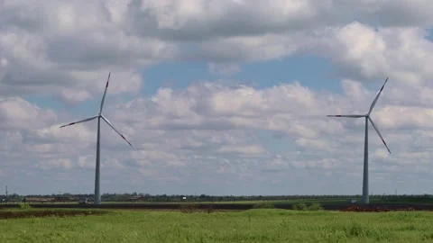 Wind Turbines Generating Renewable Energy in Countryside Landscape Stock Footage 310952711