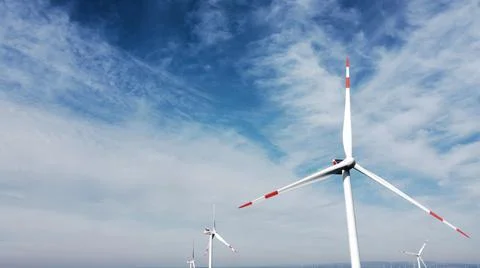 Wind turbines, green future with wind energy Stock Photos