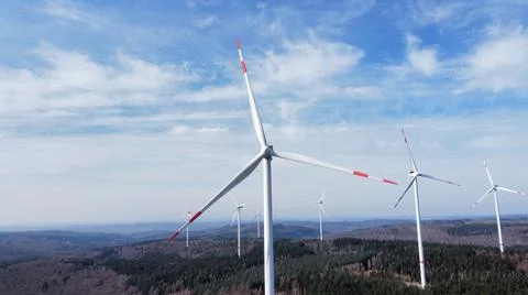 Wind turbines, green future with wind energy Stock Photos