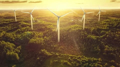 Wind turbines grow and generating electricity. Sunset with beautiful organic Stock Footage 170485292