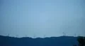 Wind turbines on hill at sunrise- renewable energy source HD Footage