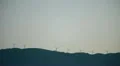 Wind turbines on hill at sunrise- renewable energy source HD Footage