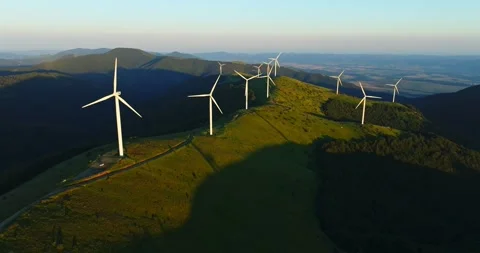 Wind Turbines Installed On Mountain Ridge Vibrant Sunset Aerial Steady Shot Stock Footage 300488069