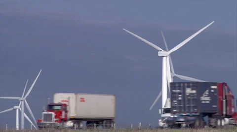Wind Turbines with Interstate traffic in foreground Stock Footage 29249925
