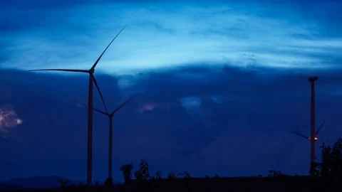 Wind turbines  with lightning and storm ,time lapse Stock Footage 79923265