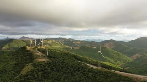 Wind Turbines Lining a Green Ridge in the Rif Mountains, Morocco Stock Footage 342693268