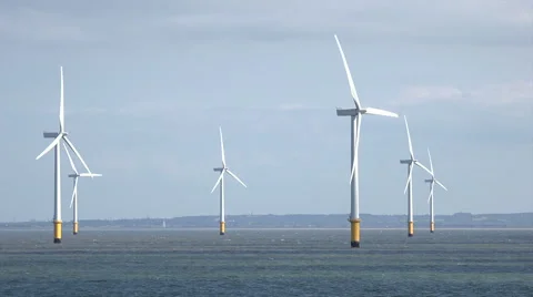 Wind turbines in liverpool bay, irish sea, england, uk Stock Footage