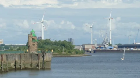 Wind turbines with Molenturm, Mouse Tower, Lighthouse, Bremen, Germany, Europ Stock Footage 135957800