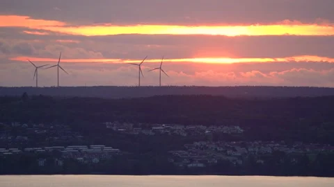 Wind Turbines in motion rotating generating green electricity Video stock 238525578