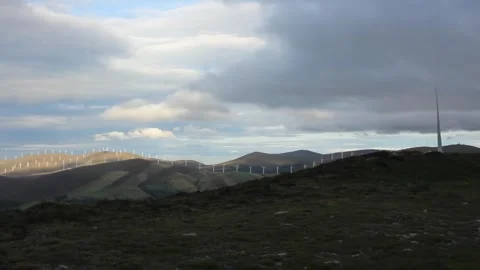 Wind turbines in the mountains to generate clean energy Stock Footage 260226411