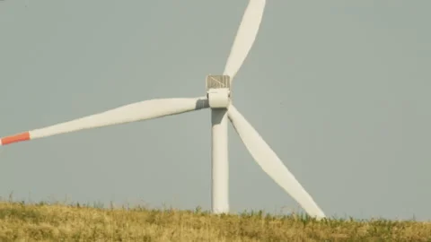 Wind turbines moved by the wind in slow motion during summer day Video stock 141815002