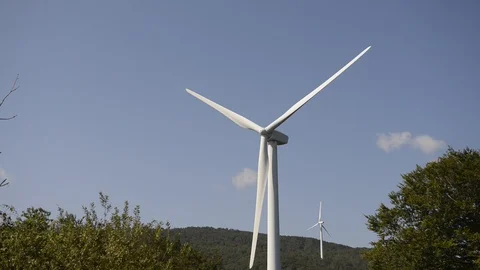 Wind turbines on nature Stock Footage 93438663