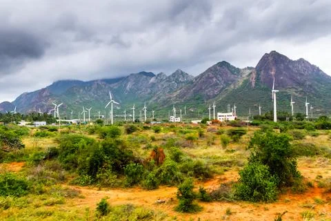 Wind Turbines near Mountain Stock Photos