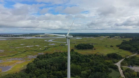 Wind turbines next to a windy coast Stock Footage 345672012
