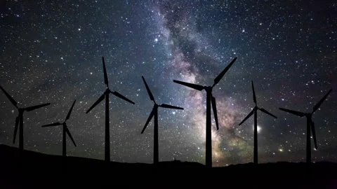 Wind turbines at night under the starry sky. Timelapse. Stock Footage 247002134