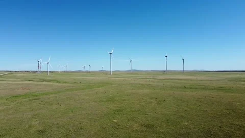 Wind turbines in an open field Stock Footage 221764307