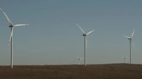 Wind Turbines on an Open Field Stock Footage 282926425