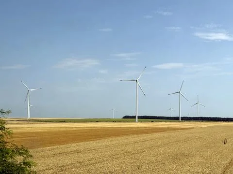 Wind Turbines in Open Field Stock Photos
