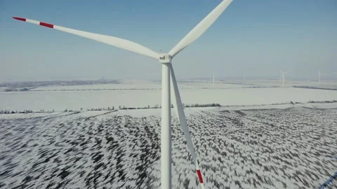 Wind turbines in an open field in winter Stock Footage 150376846