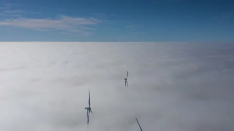 Wind turbines over clouds Video stock 150304635