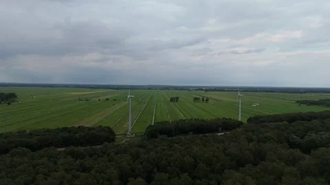 Wind Turbines Over Flat Green Farmland Aerial View 스톡 동영상 343026435
