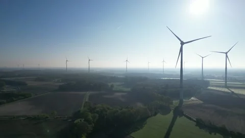 Wind turbines over forest landscape, wide aerial view Stock Footage 334679087