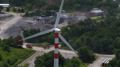 Wind Turbines over a sunset background. loop. Alternative renewable energy Stock Footage 90059257