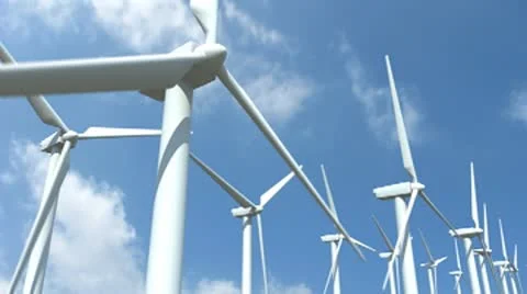 Wind Turbines Over a Timelapse Sky Stock Footage 8850385