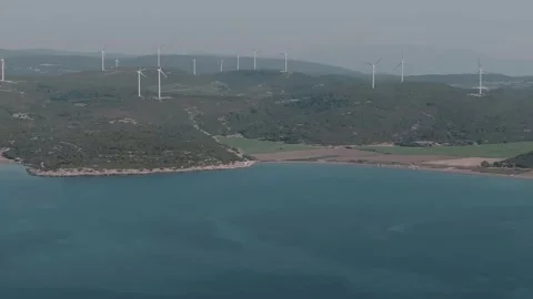 Wind Turbines Overlooking the Coast Stock Footage 282928061