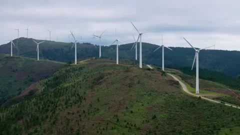 Wind Turbines Positioned on a Hilltop at the Eólico Wind Farm Stock Footage 281641991