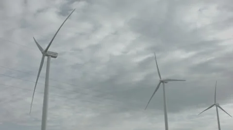 Wind turbines with powerlines Stock Footage 36027778