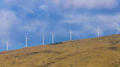 Wind turbines producing clean alternative energy Stock Footage 52402120