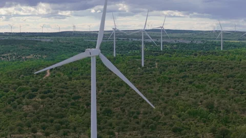 Wind turbines producing renewable green energy in a wind farm in Salamanca Видео 336210948