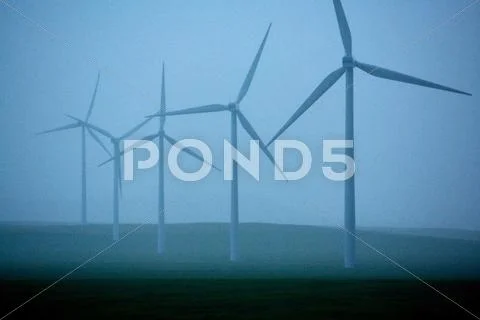 Wind turbines in the rain Stock Photos