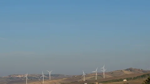 Wind turbines ratating farm on high hill, green clean energy eco technology 4k Stock Footage 117936153