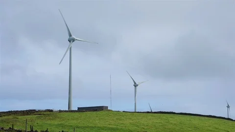Wind Turbines. Renewable energy at Eolic Park. Sky with clouds. Slowmotion Stock Footage 116561876