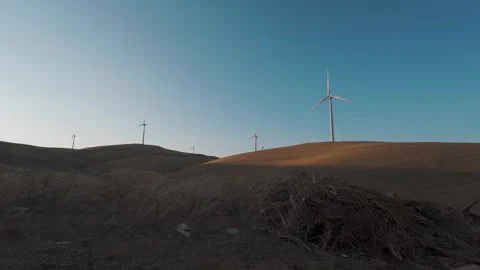 Wind Turbines on Rolling Hills at Sunset in East Bay, California Stock Footage 311538121