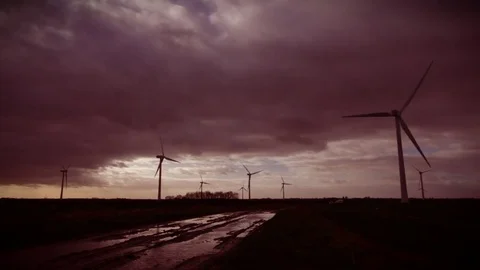 Wind turbines rotating on a cloudy day 스톡 동영상 84035213