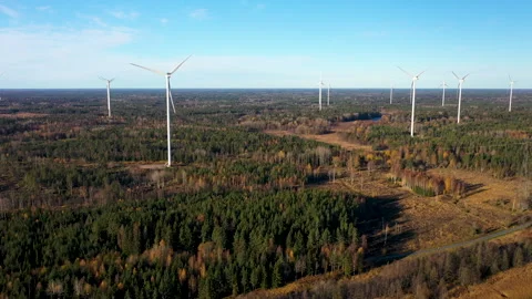 Wind turbines rotating in forest landscape, aerial view Stock Footage 289014601