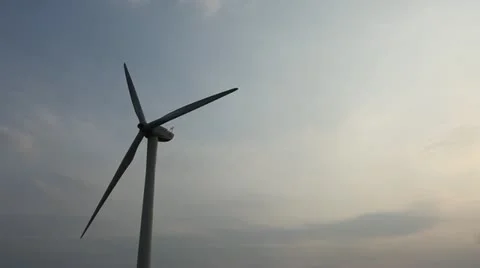 Wind turbines rotating on hill Stock Footage 22148882