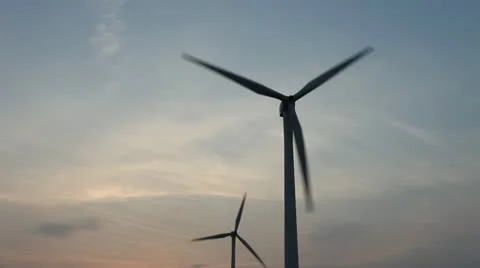 Wind turbines rotating on hill Stock Footage 22148895