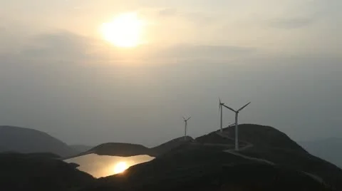 Wind turbines rotating on hill Stock Footage 22149023